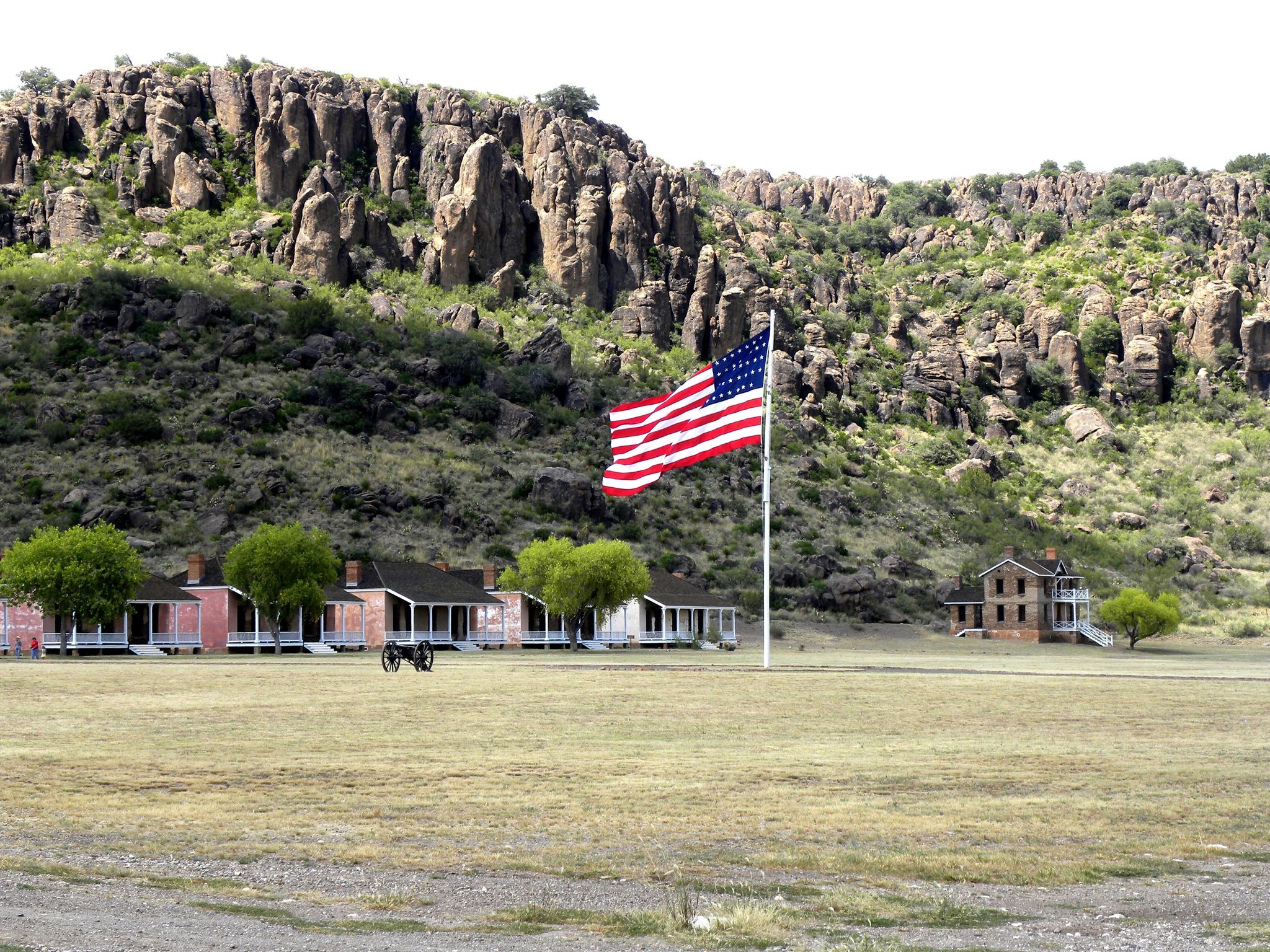 Garrison flag flying over the post within the box canyon Fort Davis is located.