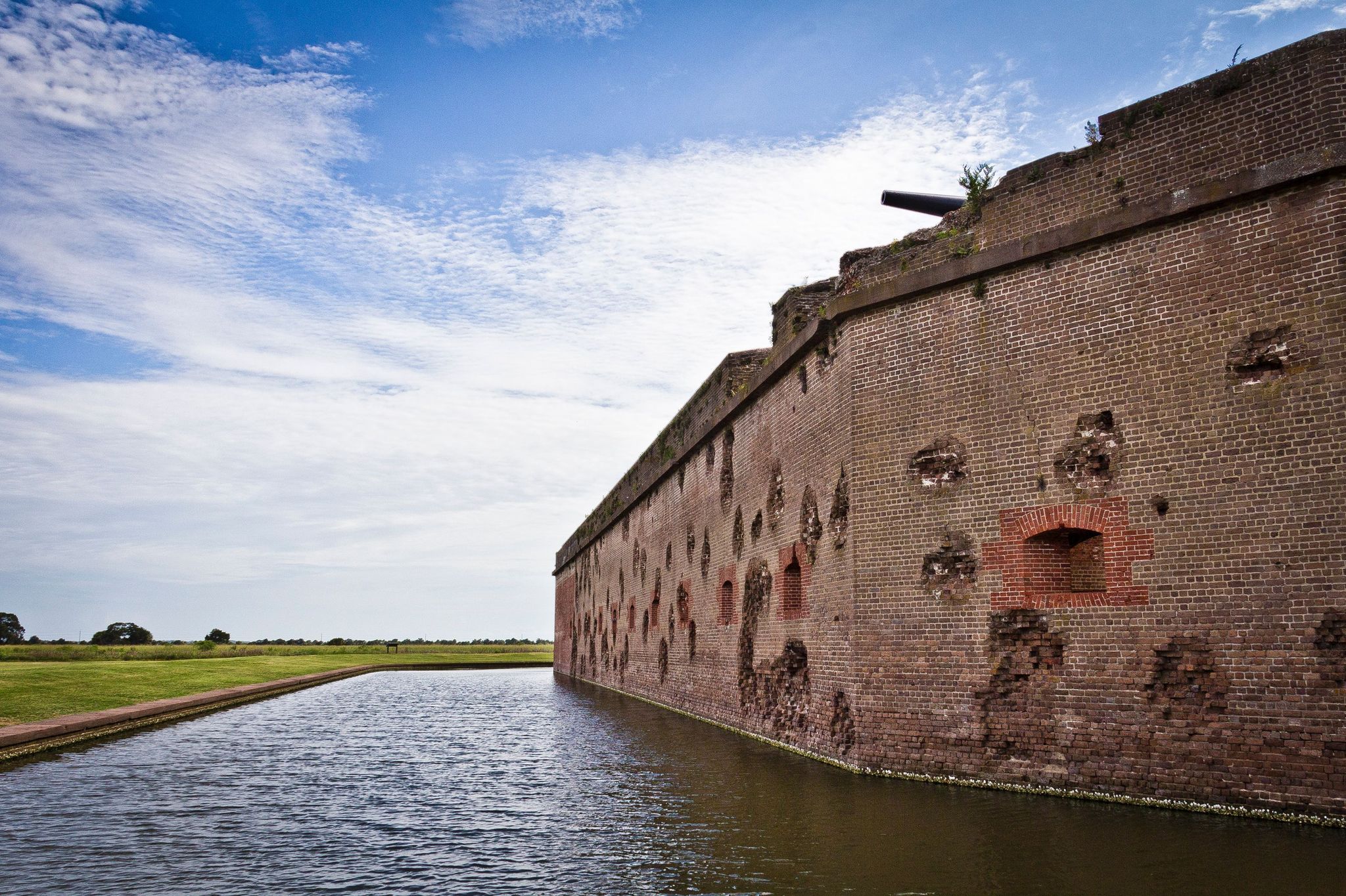 A walk along the outside of Fort Pulaski reveals damaged walls over 150 years after the Civil War.