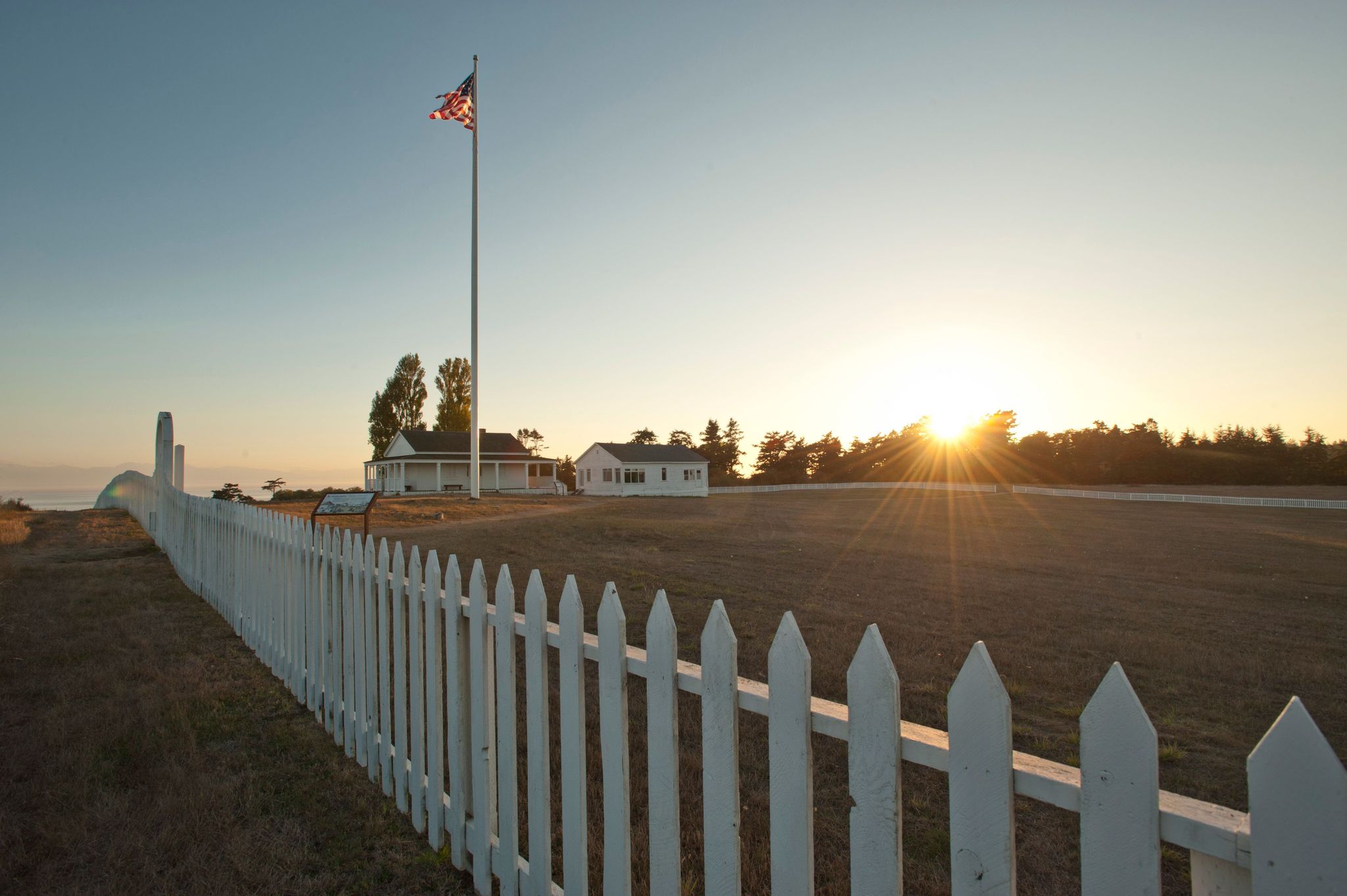 The sun sets on the American Camp parade grounds