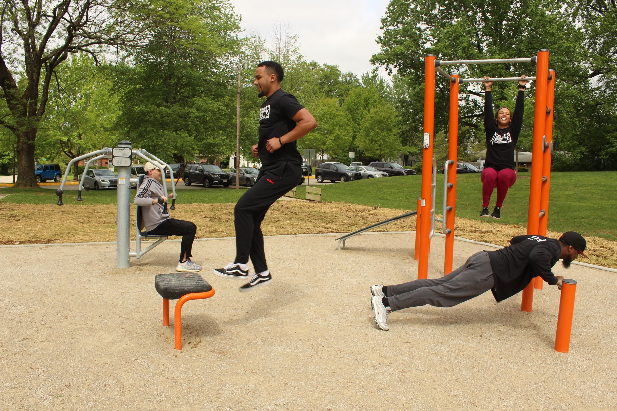 Fitness station at Bryan Park showing four different apparatus