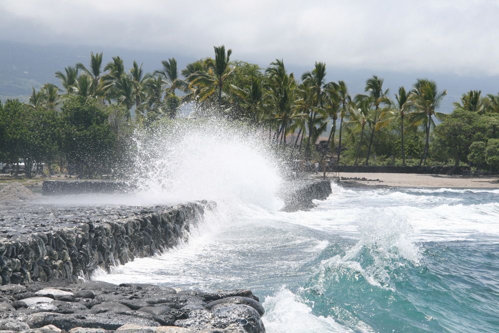 Winter Surf hits Kaloko Fishpond Wall. The constant surf requires ongoing maintenance to the dry stack wall.