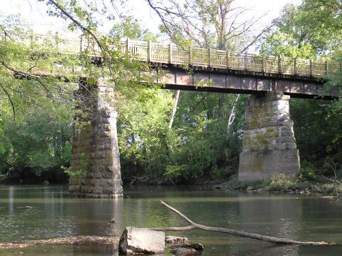 The Frisco Highline Trail crosses 16 railroad bridges, including this 1880's beauty on the Little Sac River, at mile marker 23.