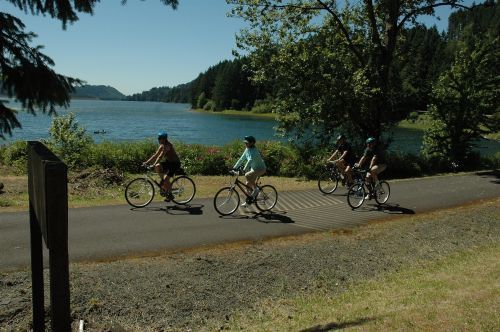 Bicyclists enjoying a ride around Dorena Reservoir along the Row River Trail