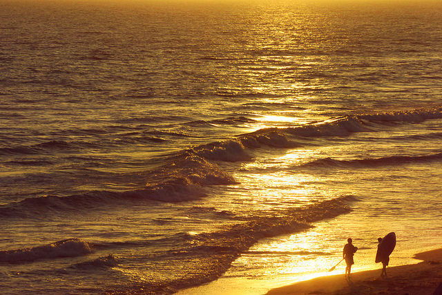 Paddleboard and sunset on Huntington Beach SB