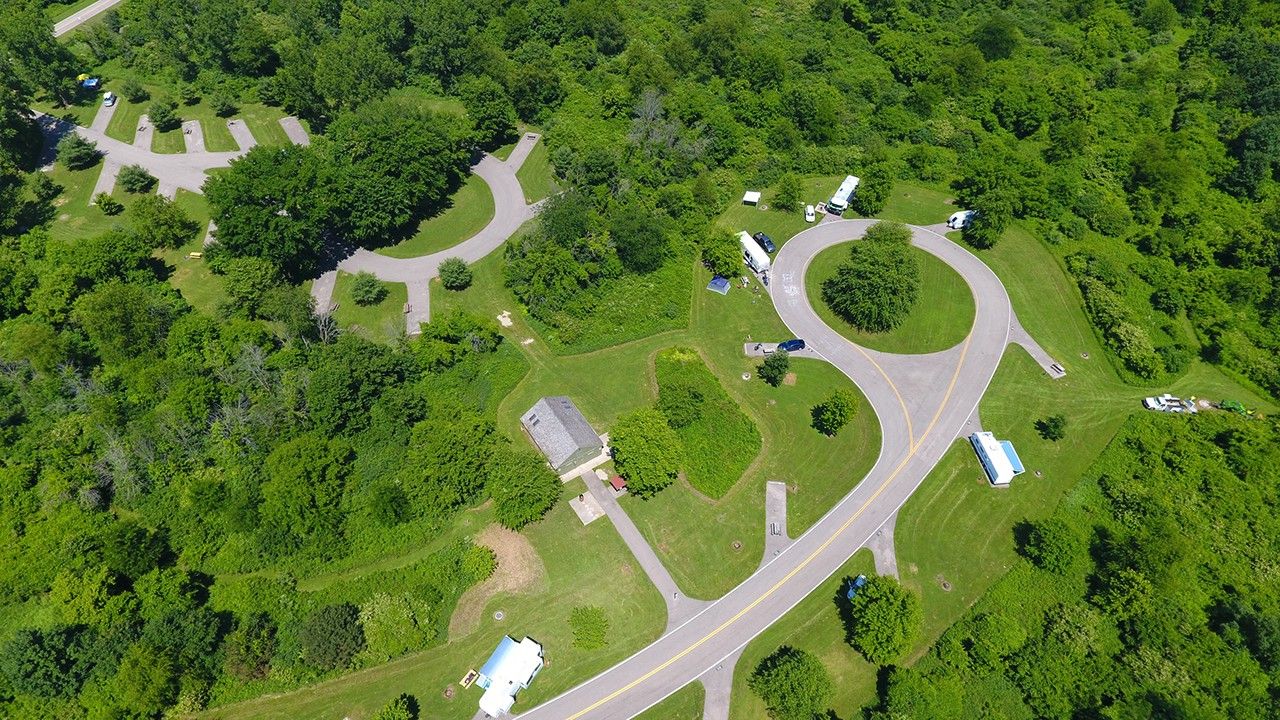 Aerial view of a campground surrounded with trees at Buck Creek State Park.