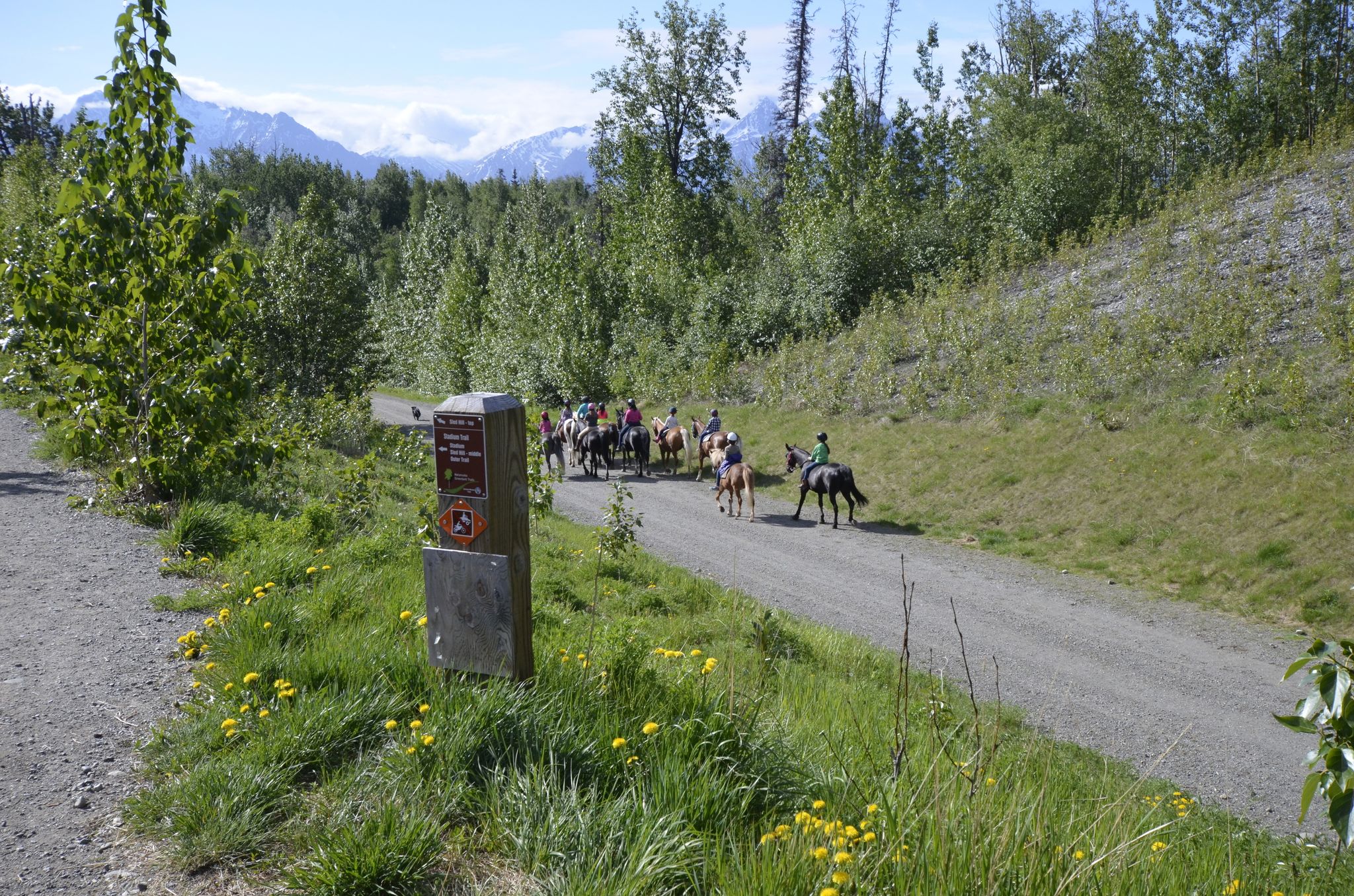 Riders heading out at Crevasse-Moraine Trailhead