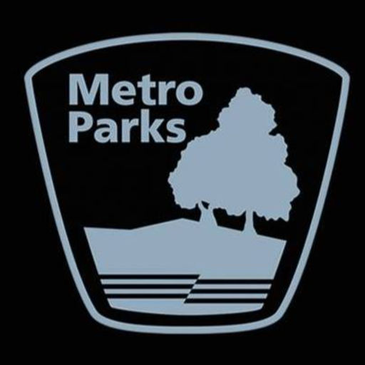 Metro Parks logo in grey with black background