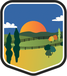 An illustrated badge for the Kentucky community depicting fields surrounded by fences with tall trees under a dark blue sky.