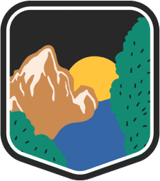 An illustrated badge for the Montana community showing a mountain range with snow-capped peaks, a river, and the moon in the background.