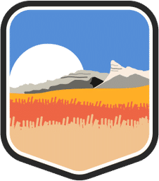 An illustrated badge for the Nebraska community showing a prairie landscape with tall grasses and a wide-open sky.