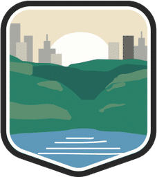 An illustrated badge for the New York community showing a forested city park with buildings surrounding it under a blue sky.